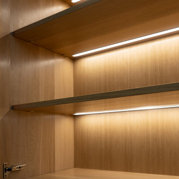 Modern solid oak bookshelf with an asymmetric design