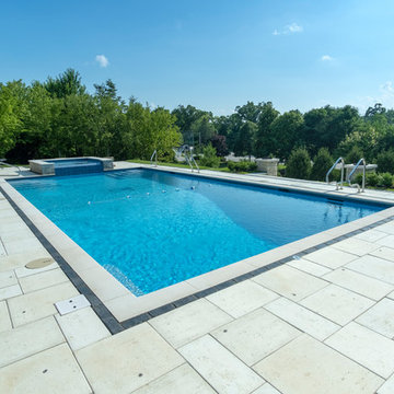 Burr Ridge Lap Pool with Raised Hot Tub and Waterfall