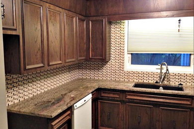 Kitchen - contemporary kitchen idea in Other with dark wood cabinets, soapstone countertops, multicolored backsplash, matchstick tile backsplash and stainless steel appliances