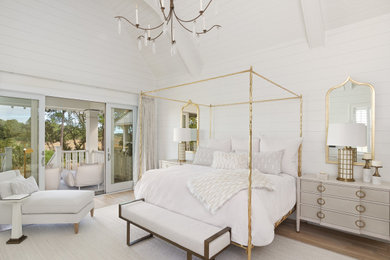 Bedroom - huge transitional master light wood floor, beige floor, shiplap ceiling and shiplap wall bedroom idea in Charleston with white walls