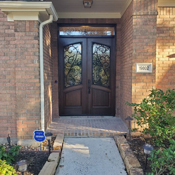Wood Doors with Wrought Iron