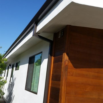 Costa Mesa, New Modern Home. Angle Face 5 inch Gutters, Smooth Downspouts.