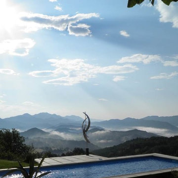 Outdoor Living with hand-made aluminum metal artwork by Jon Allen