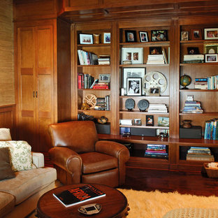 Example of an island style home theater design in Charleston