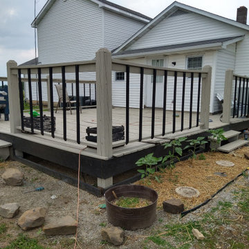 Small raised enclosed garden and patio area