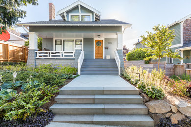 Example of a mid-sized arts and crafts home design design in Seattle