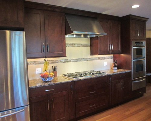 before & after - maple cabinets in cordovan stain with cambria