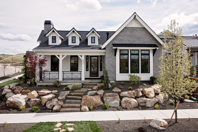 Example of a country exterior home design in Boise