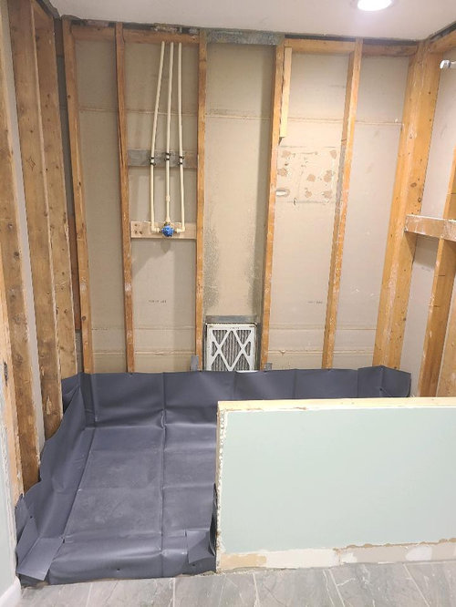 Penny tile shower floor grout is cracking. Normal?