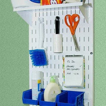 Laundry room pegboard storage and organization with Wall Control white pegboard