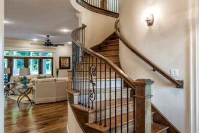 Mid-sized elegant staircase photo in Other