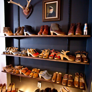 Eclectic women's storage and wardrobe in New York with open cabinets.