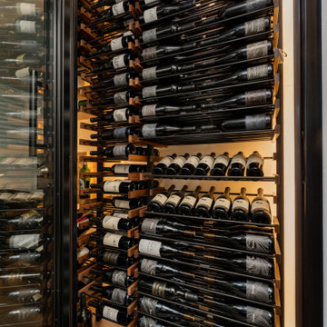 Modern Glass Wine Cellars with Metal Racking