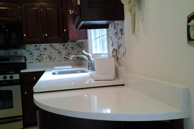 Kitchen - traditional kitchen idea in Other