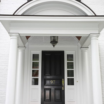 New England White Brick Home