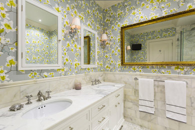 Bathroom - traditional master white tile and marble tile bathroom idea in New York with recessed-panel cabinets, white cabinets, multicolored walls, an undermount sink and marble countertops