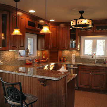 Traditional toffee kitchen remodel with multi-color mosaic tile back-splash