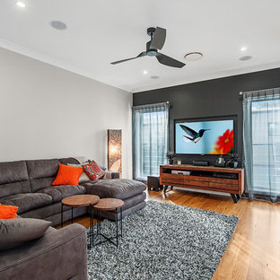 Example of a trendy home theater design in Newcastle - Maitland