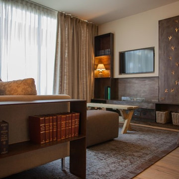 Living room with corten steel fireplace