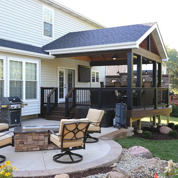 Curved Deck with Fixed Roof, Built-in Bar, and Privacy Wall