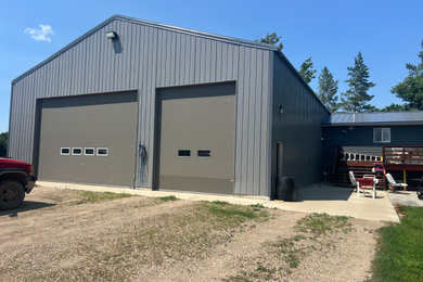 Garage - huge four-car garage idea in Austin
