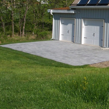 Close up of garage doors and stone work.