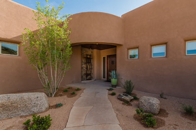 Example of an exterior home design in Albuquerque