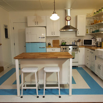 A California Cabin featuring a Beach Cruiser Retro Fridge and a white Pro-Range