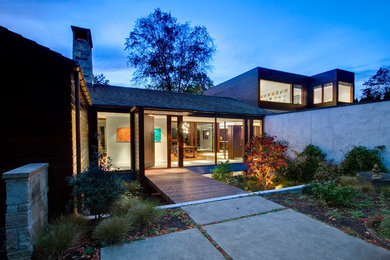 Example of a mid-sized trendy exterior home design in Seattle