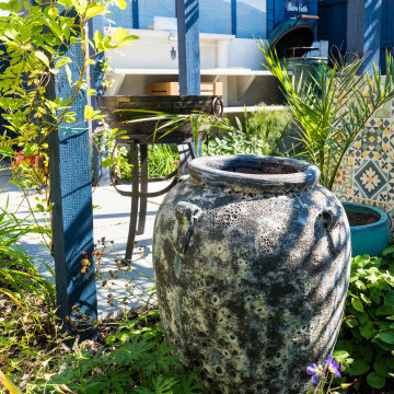 Pots, plants and colours in this Mediterranean Kitchen Garden