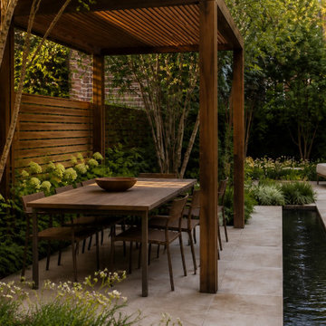 Layered Urban Courtyard Concept for a Narrow Townhouse Backyard