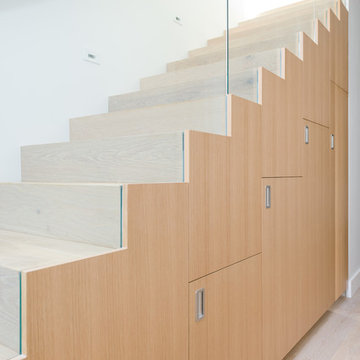 custom rift oak storage at entry stair