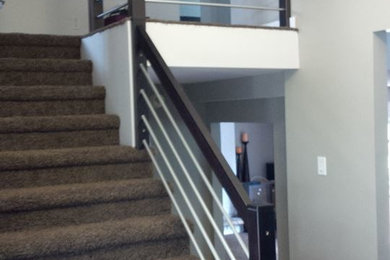 Staircase - contemporary staircase idea in Other