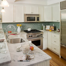 Kitchen ideas - white cabinets light countertops