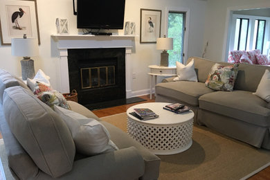 Beach style living room photo in Charleston