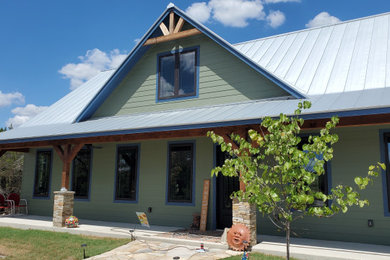 Example of a country exterior home design in Austin