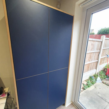 Blue Fenix plywood kitchen.