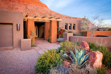 Southwest one-story adobe exterior home photo in Salt Lake City
