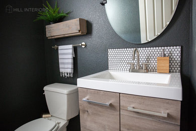 Example of a trendy black and white tile ceramic tile and white floor powder room design in Denver with gray walls