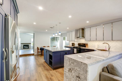 Mid-sized transitional l-shaped open concept kitchen photo in Los Angeles with a peninsula