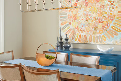 Example of a transitional enclosed dining room design in New York with beige walls