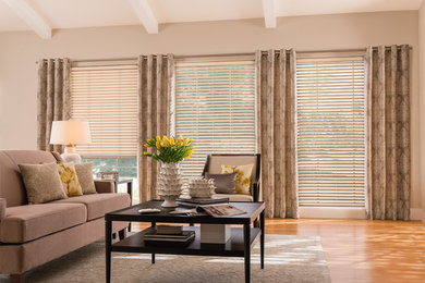 Example of a large transitional formal and open concept light wood floor living room design in Other with beige walls, no fireplace and no tv