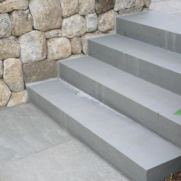 Enduring materials of solid bluestone steps and fieldstone foundation