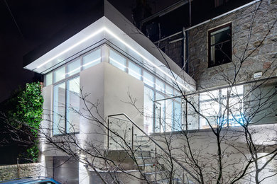Design ideas for a contemporary house exterior in Other.