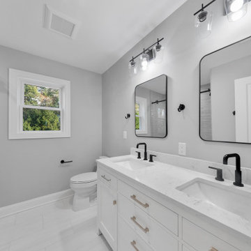 Bathroom with Black Fixtures and Double Vanity