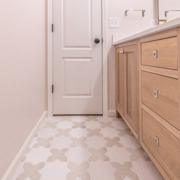 Playful Guest Bath Remodel with Fun Tile and Mixed Metals