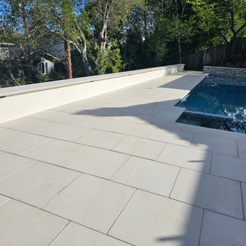 New patio, sitting wall and low volt lights