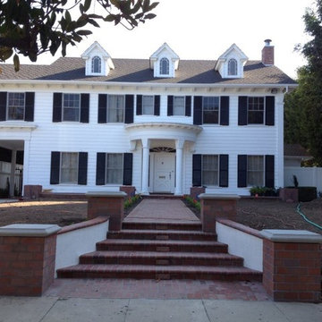 Brick Walkway, Steps, and Patio with Columns and Concrete Caps