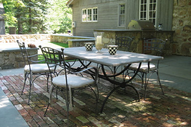 Patio - brick patio idea in New York