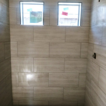 Custom Marble shower with 3D pan tile